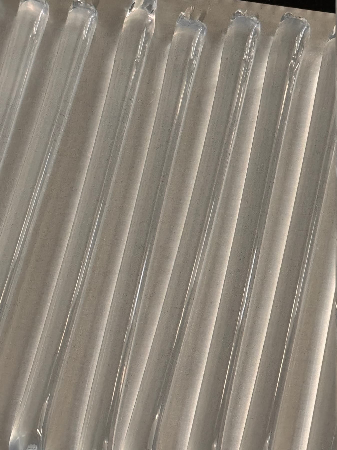 Clear sealant bead samples for quality comparison