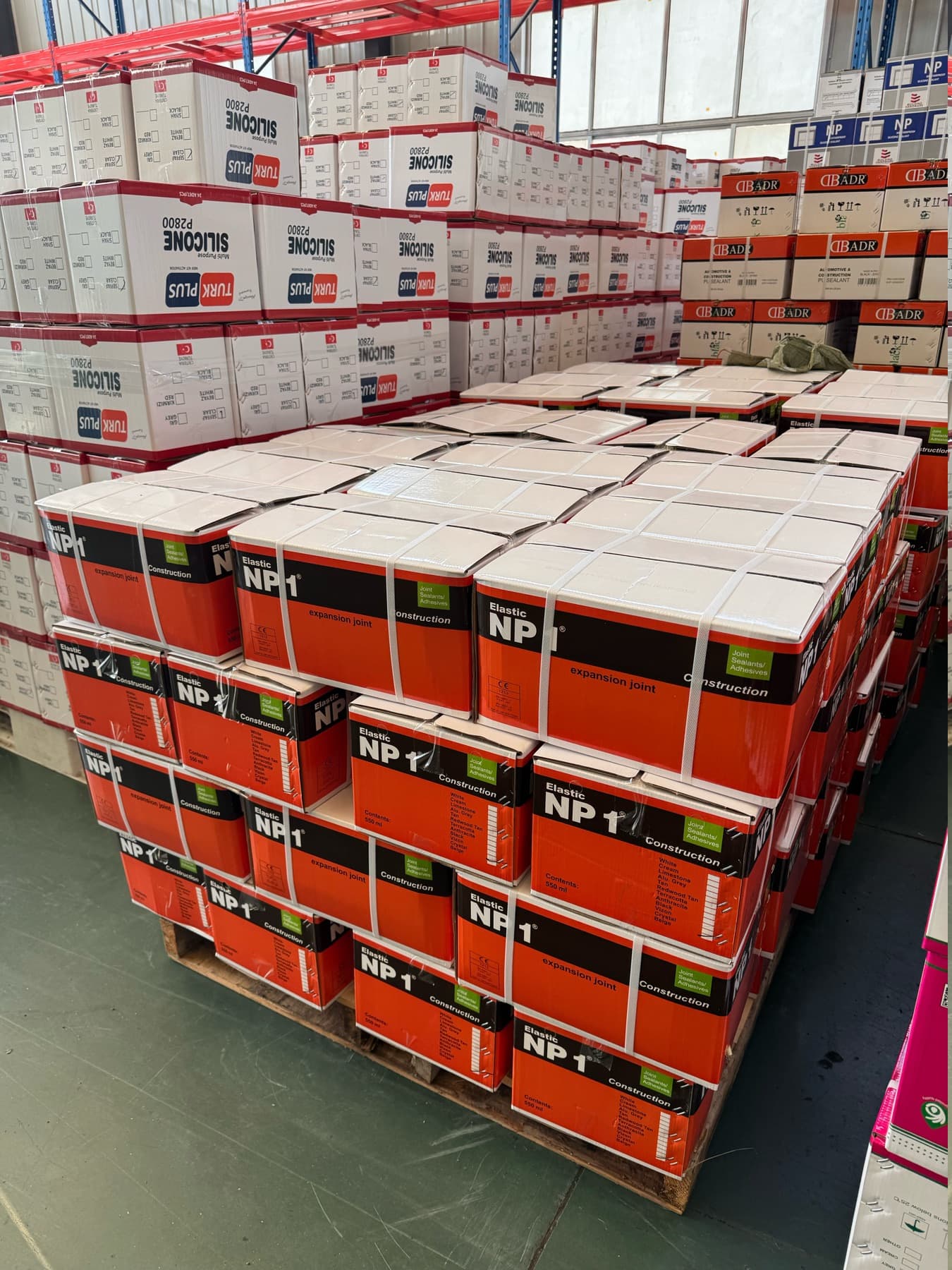 Palletized sealant cartons ready for distribution